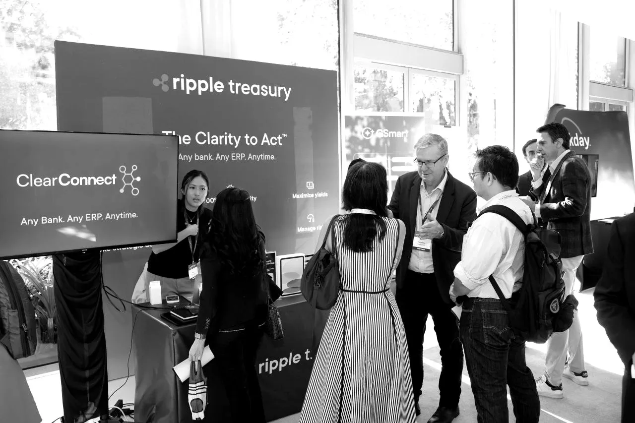Visitors at the Ripple Treasury exhibition booth